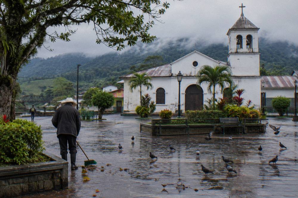 Quiet colonial-era church and central plaza in a small Costa Rican farming town